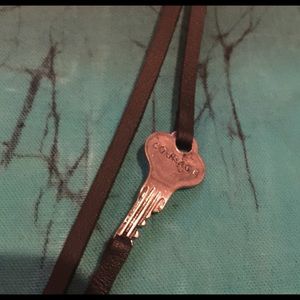 Leather band bracelet representing COURAGE